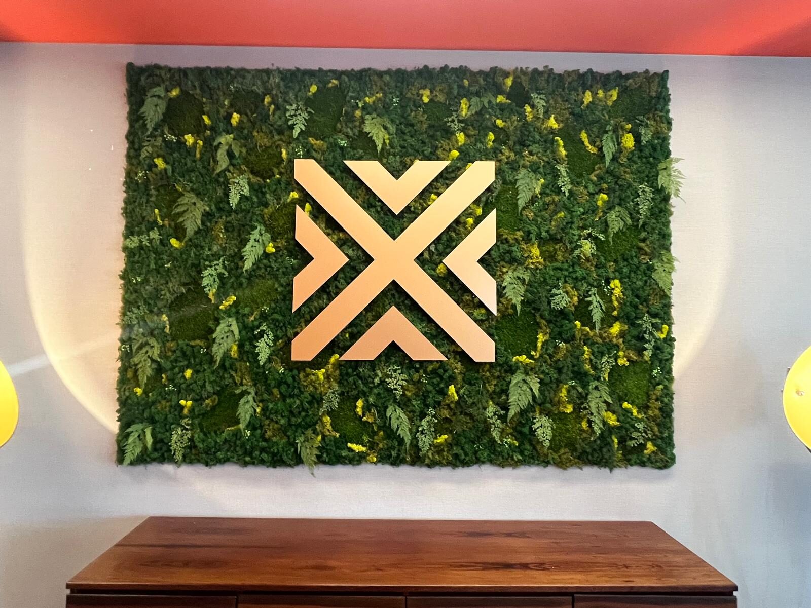 C. Wall and C. Custom project with preserved plants in a Lisbon office
